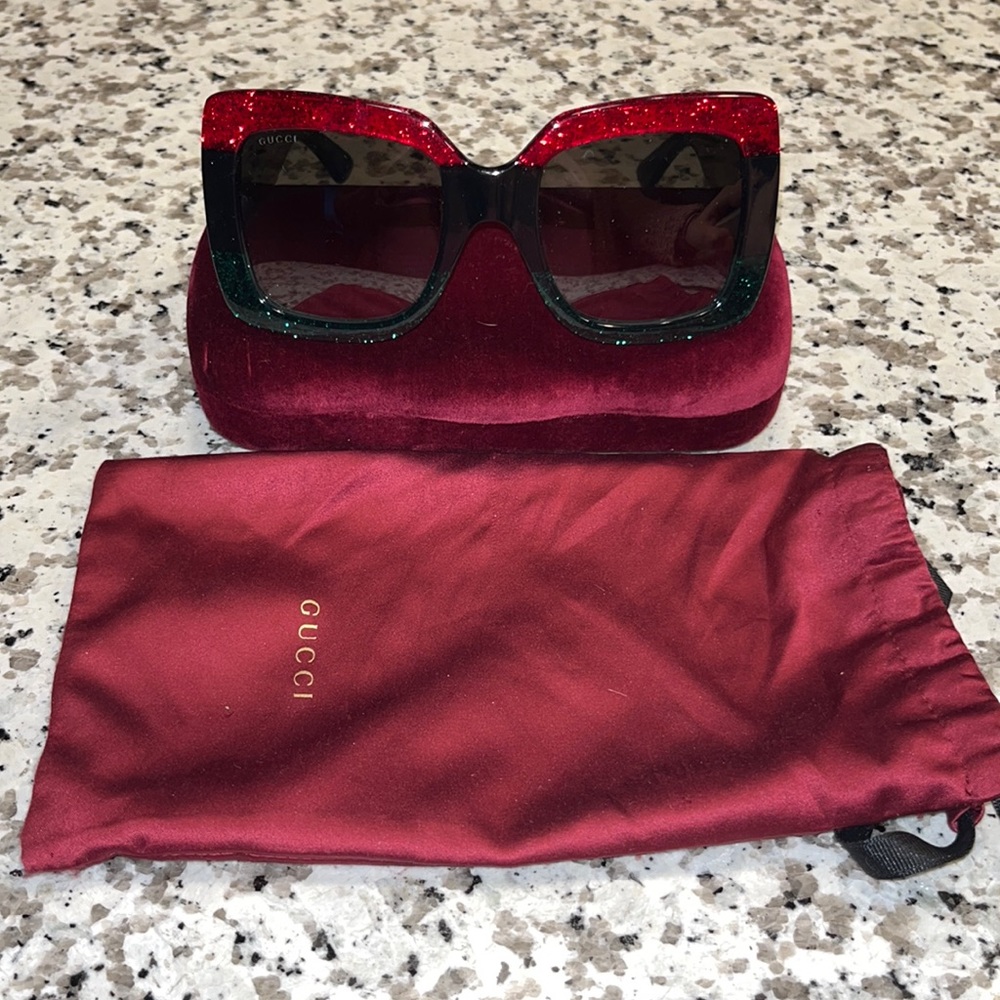 Beautiful classic Gucci glasses. The signature red, green and black colors